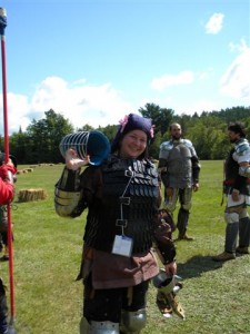 Aneleda is a delicate flower of the Northern Army, posing in her SCA armor kit.